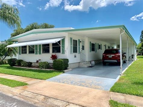 Mobile Home for Sale in Florida Welcome to Holiday Condo, OWN YOUR LAND NOT a 55 park, Pet friendly and close to the beaches. . Zillow florida mobile homes